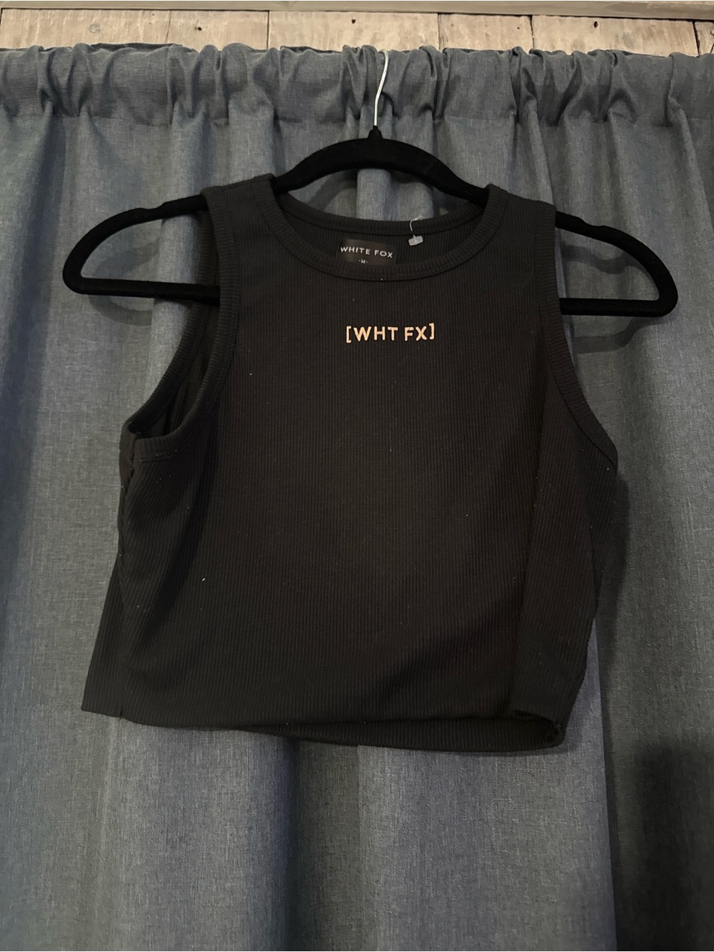 White Fox Ribbed Cropped Tank Top
Size Medium